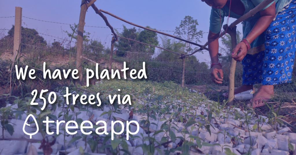 woman in background planting trees - white text stating 'we have planted 250 trees via treapp'