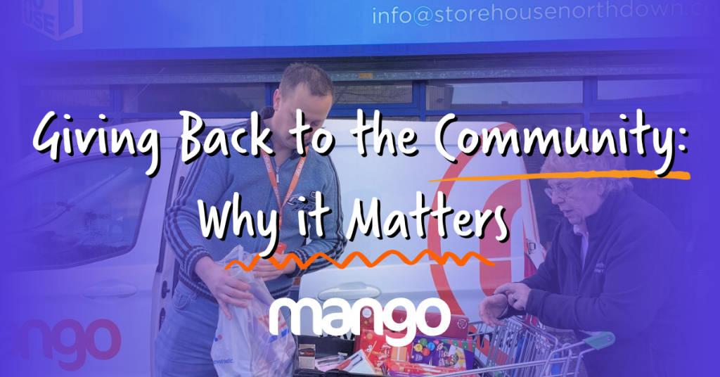 giving back to the community featured image - man helping woman by putting shopping bags in trolley for food bank