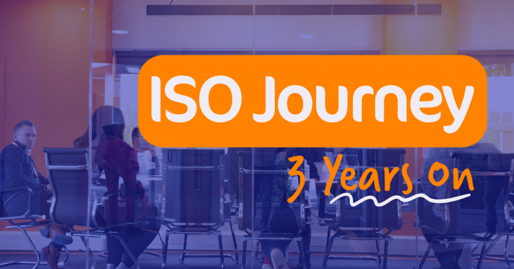 Image of office with Purple Overlay. white text on orange background saying 'ISO Journey 3 years on'